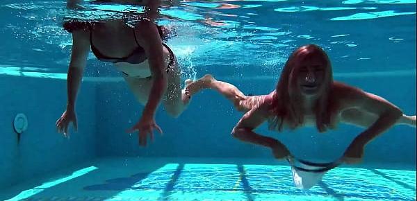  Jessica and Lindsay swim naked in the pool